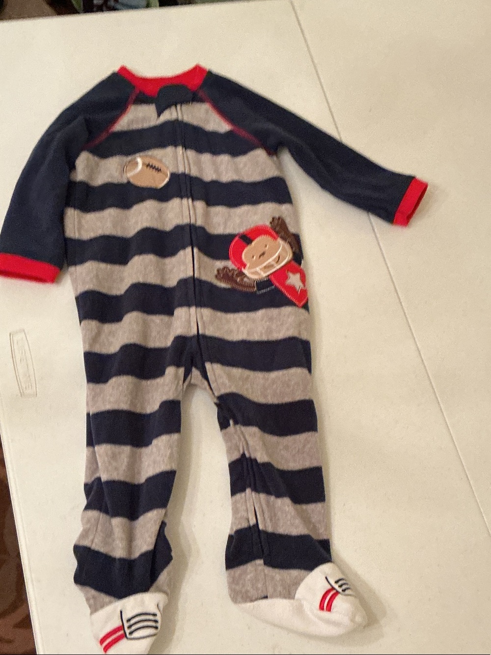 Little Me Navy and Gray Striped Footed One-Piece Pajamas with Red Trim